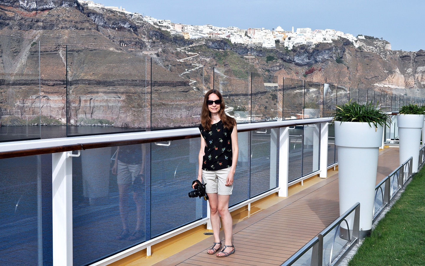 Sailing out of Santorini on the deck of the Celebrity Equinox