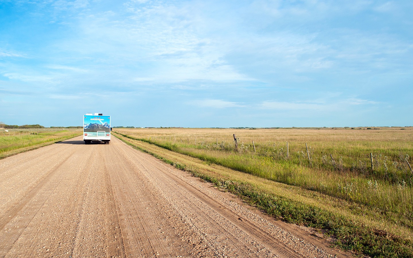 RV on an unsealed road in the Canadian Prairies