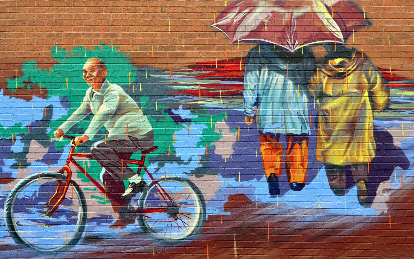 Mural in Chinatown showing a man riding a bicycle