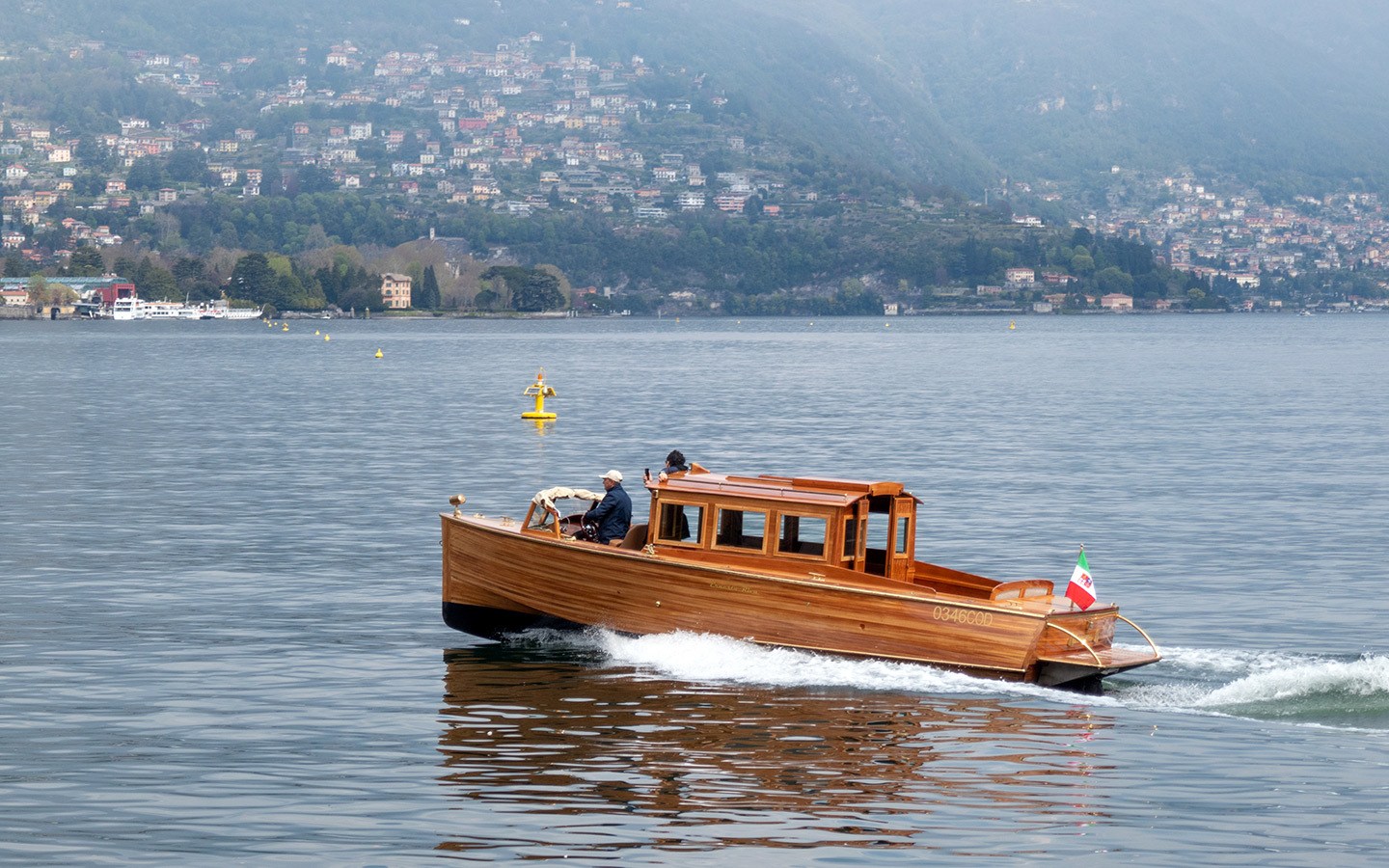 A classic wooden Riva speedboat on Lake Como