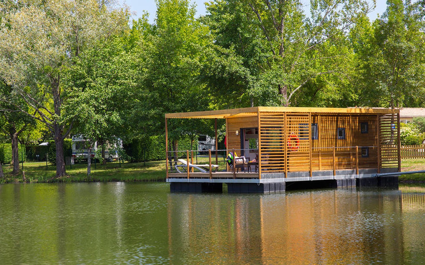 A waterfront cabin glamping site in France