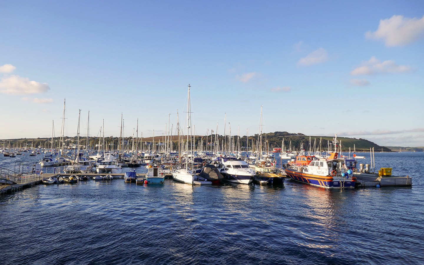 Boats in the harbour at sunset