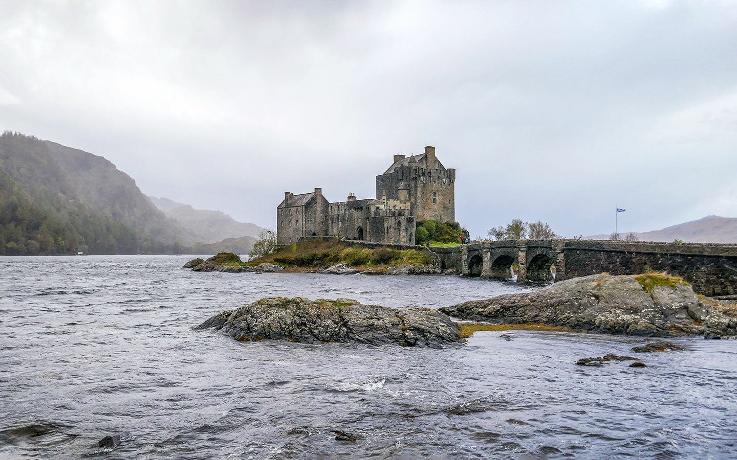 Eilean Donan Castle under grey stormy skies
